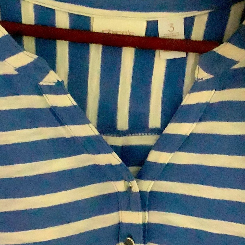 Chico’s size 3 women’s flown top. Great with white or navy pants!